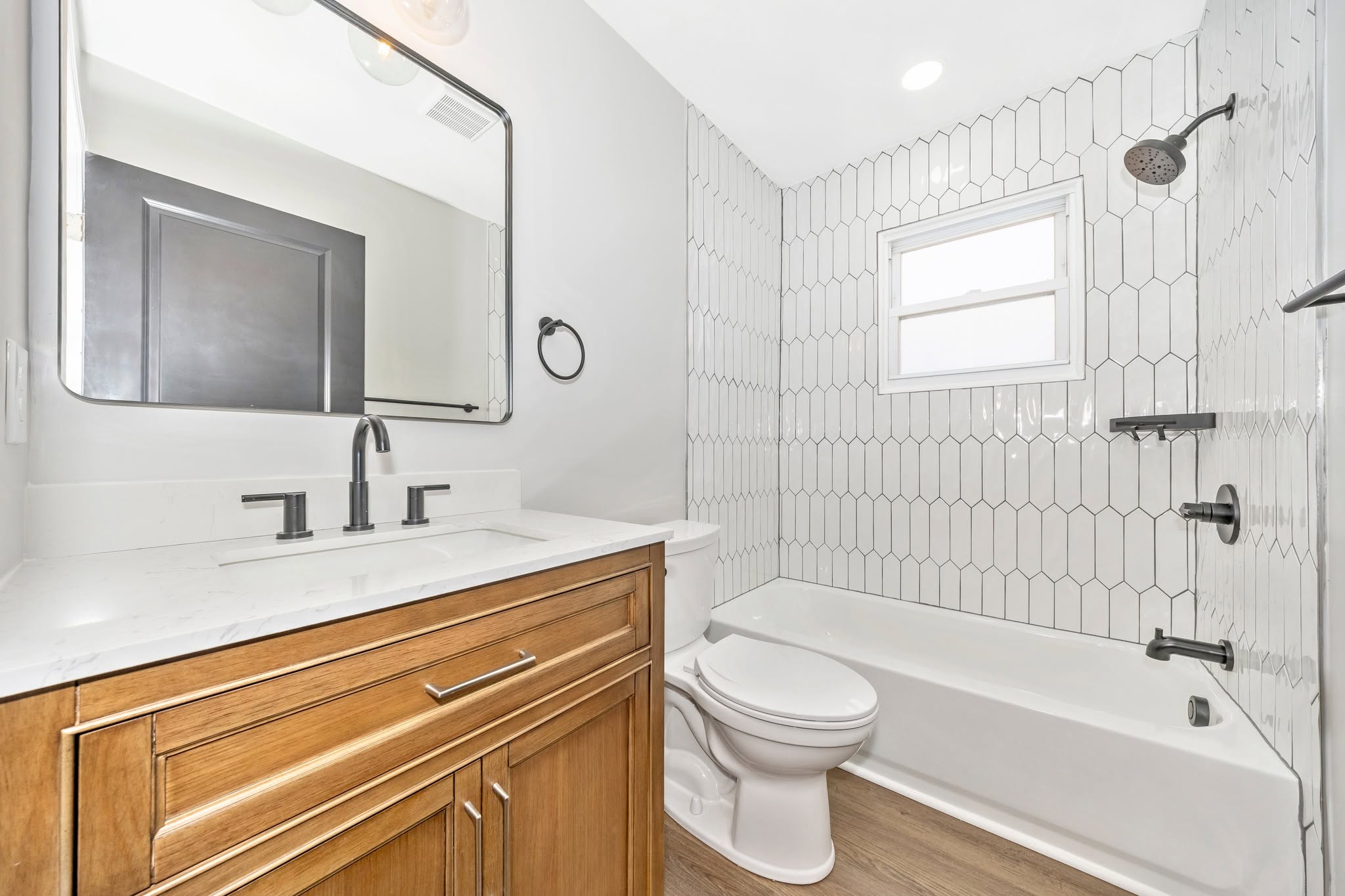 Renovated bathroom after AKO House Buyers purchase in Maryland